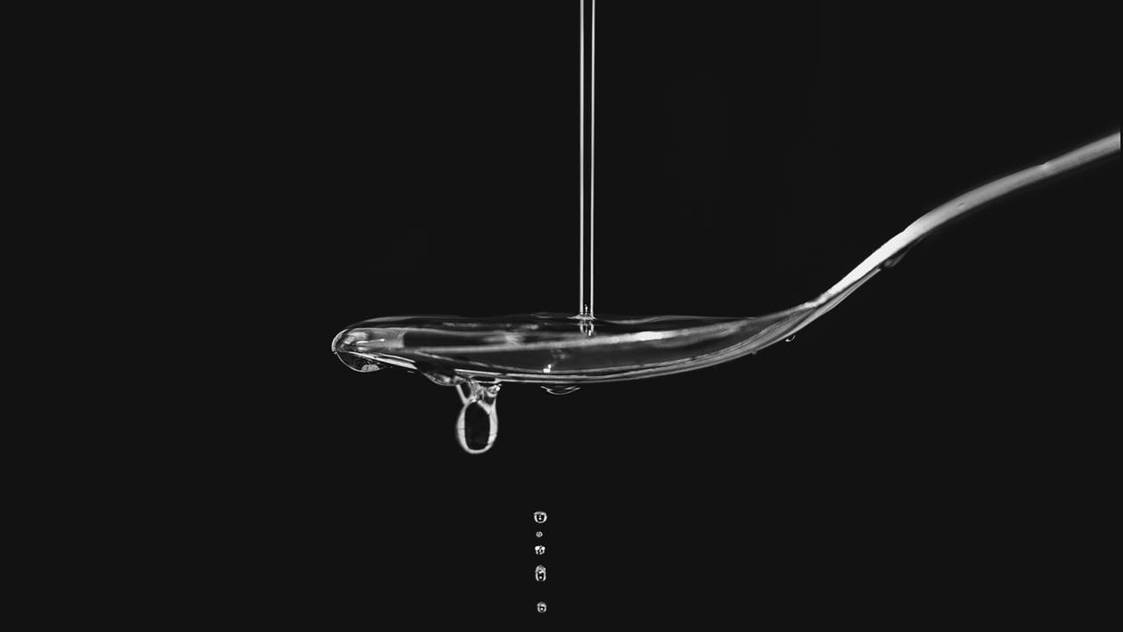 Measuring water using a spoon