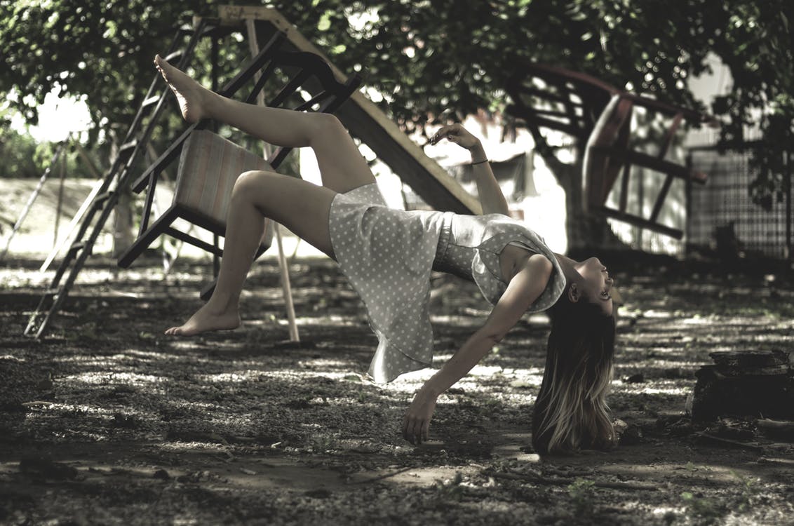 Woman falling off a swing