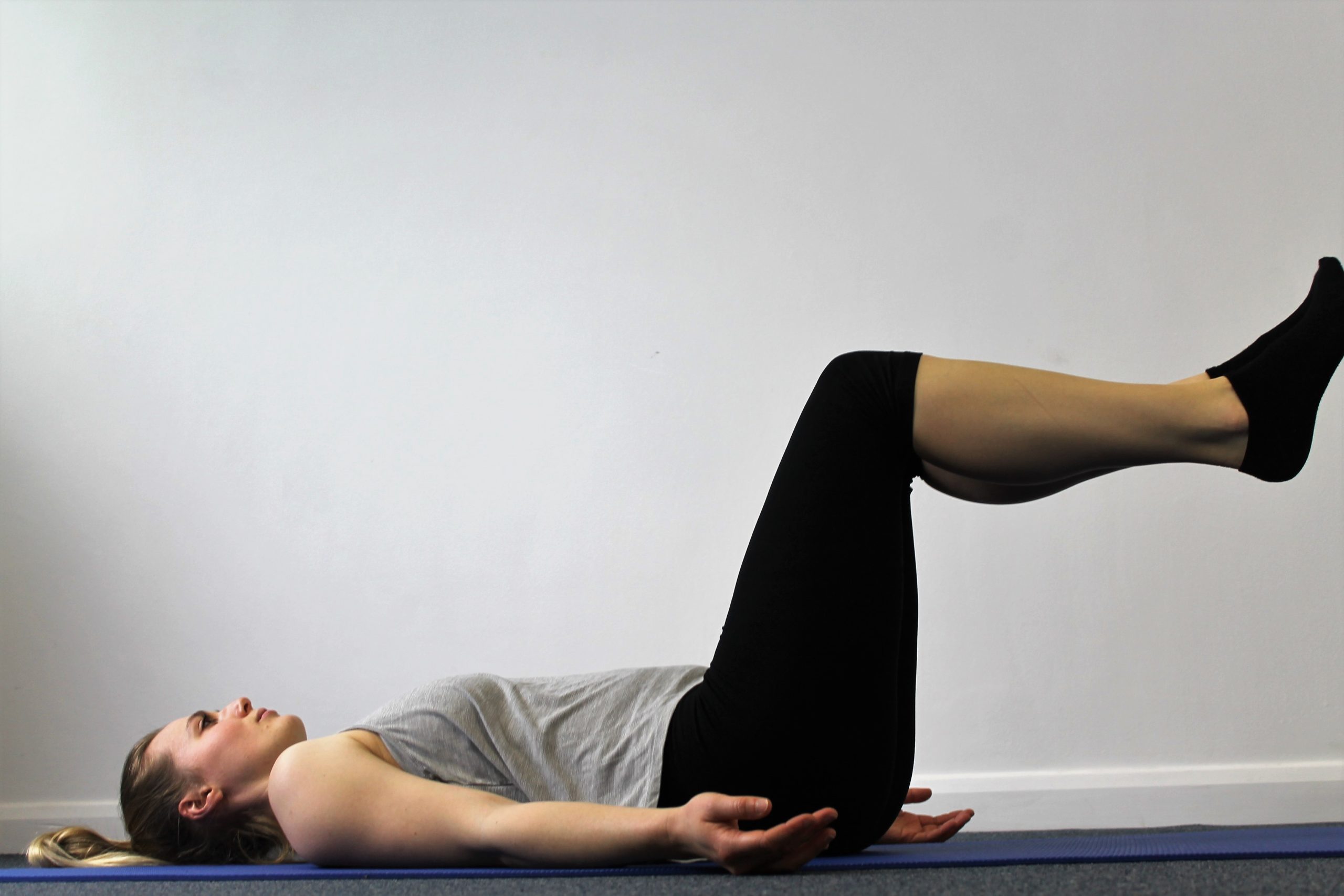 Back-lying-Pilates-Pose-2-Enhanced-scaled Shrewsbury sports massage therapy sports massage therapist performing a sports massage